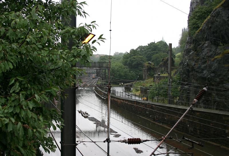PSG Flooding: Two days of heavy rain the four tracks through Princes Street Gardens flood on 07.08.08, bring chaos to all services travelling to and from Waverley. Photo of PSG Flooding
