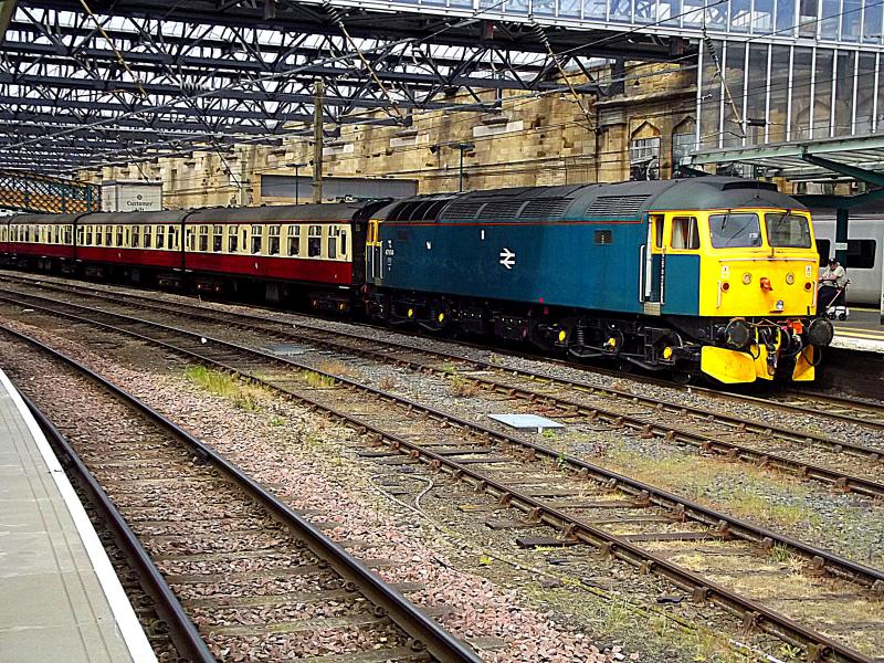 47614 at Carlisle: Wearing its BR Blue livery 47614 waits at Carlisle with a Private Charter from Crewe via Settle, on 21st May 2022. 60007 is on the rear. Photo of 47614 at Carlisle
