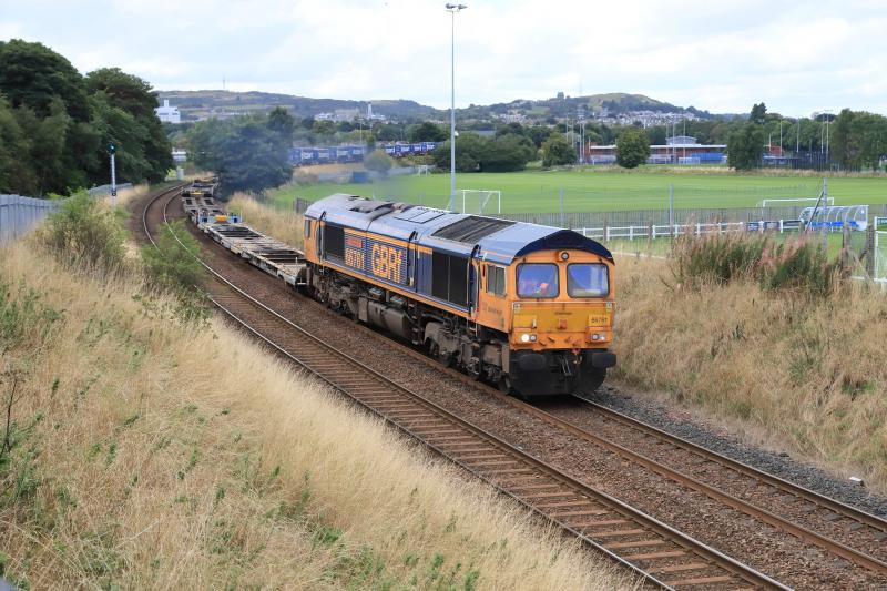 No Sun on 4E04: 66761 on 4E04 11.06 Mossend P.D. Stirling to Doncaster Iport passing Peffermill Playing Fields on 07/09/2022. First 6 twins were empty. Photo of No Sun on 4E04