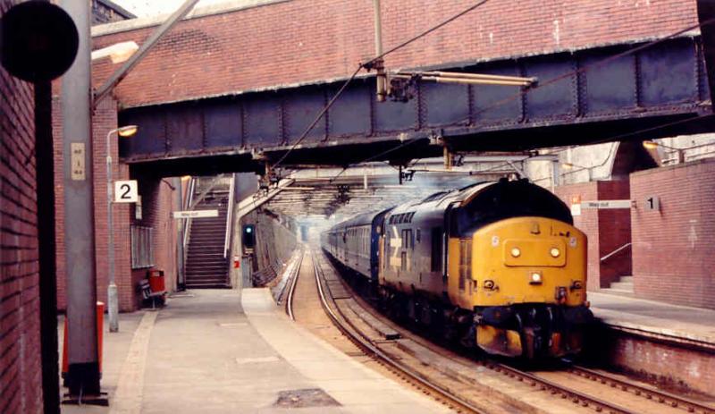 Through Dalmarnock: 37422 heading a special from Newcastle to Oban through Dalmarnock in April 1988. She then disgraced herself at Anniesland causing a wee bit of disruption and diversion to North Electric and Argyle Line services! Photo of Through Dalmarnock