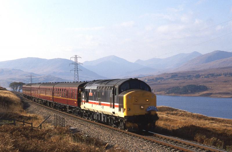 The Claymore: Inter-City red stripe liveried 37 approaching Achallader with Loch Tulla in the background. The Claymore tour 30 October 1993. Photo of The Claymore