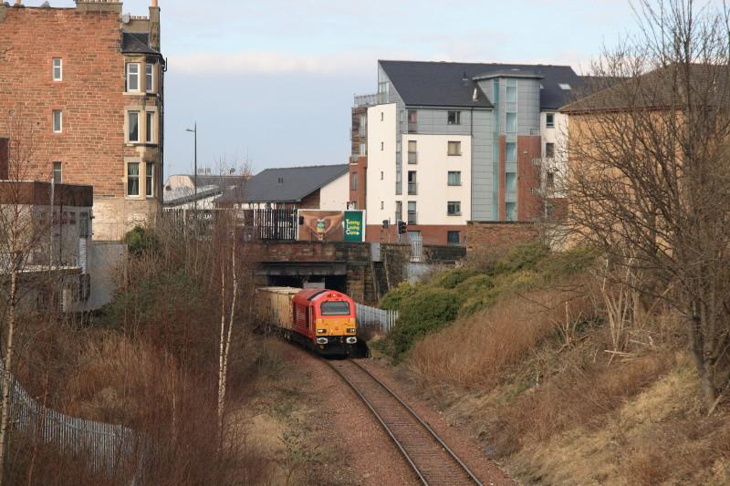 67018 on 6B45: 67018 on the early running 6B45 10.25 Powderhall to Oxwellmains passing under Easter Road next to the disused platforms. Photo of 67018 on 6B45