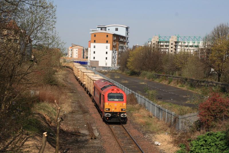 67018 on 6B45: 67018 on 6B45 Powderhall to Oxwellmains passes the site of Lochend Jct on 16/04/2010. This view is a little clearer after tree felling. Photo of 67018 on 6B45