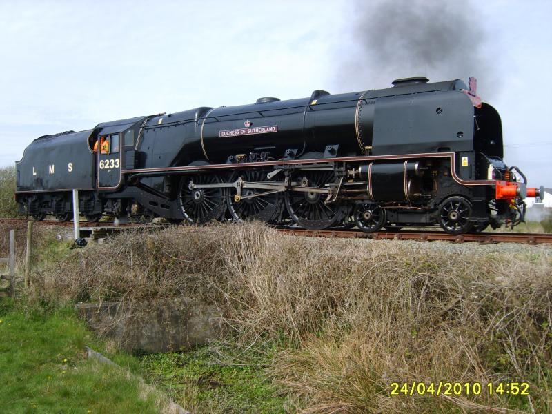 Lady in Black.: 6233 Duchess of Sutherland stands on the turning triangle at Valley, N Wales in resplendent new livery. Unfortunately I do not think she is due to come north of Carlisle this year. Photo of Lady in Black.