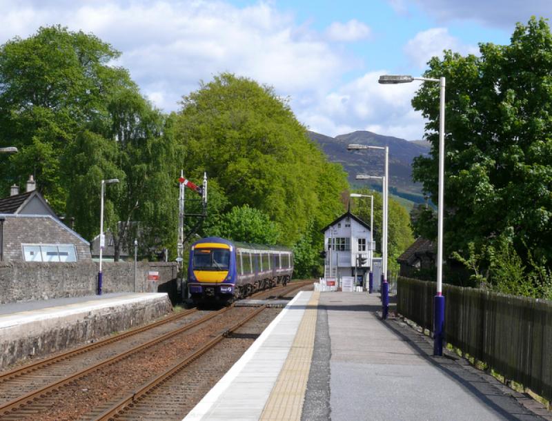 170410: Through train for Glagow races through Blair Atholl. 170.410 Photo of 170410