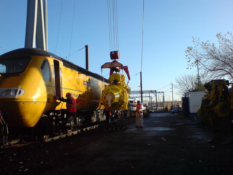 New engine being fitted 1: In my recent truck driving days I was doing a delivery to a Railtrack Yard somewhere in Edinburgh. Got lucky and saw this going on. Photo of New engine being fitted 1