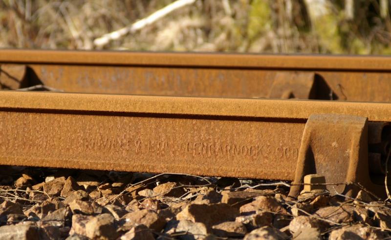 Colville Glengarnock Rail: Rail on Kyle line a few miles west of Garve imprinted with Photo of Colville Glengarnock Rail