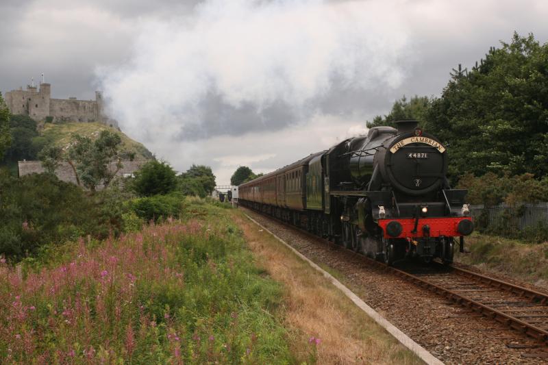 Ex-Sovereign at Harlech : 44871 leaves Harlech its way to Pwllheli with The Cambrian on a dull 13 August 2010 Photo of Ex-Sovereign at Harlech