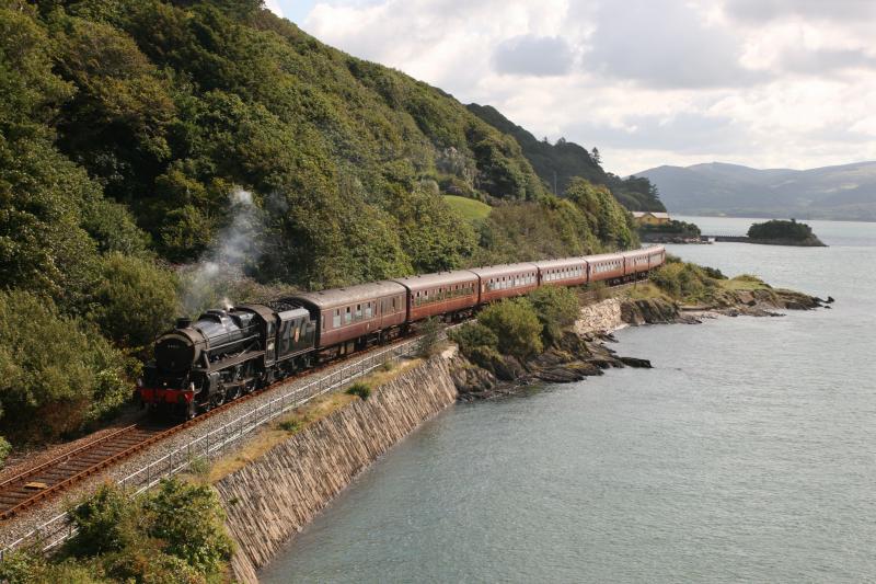 Ex-Sovereign near Aberdyfi: 44871 weaves round the sunlit edge of the Dyfi estuary as it approaches Aberdyfi with The Cambrian on 11 August 2010 Photo of Ex-Sovereign near Aberdyfi