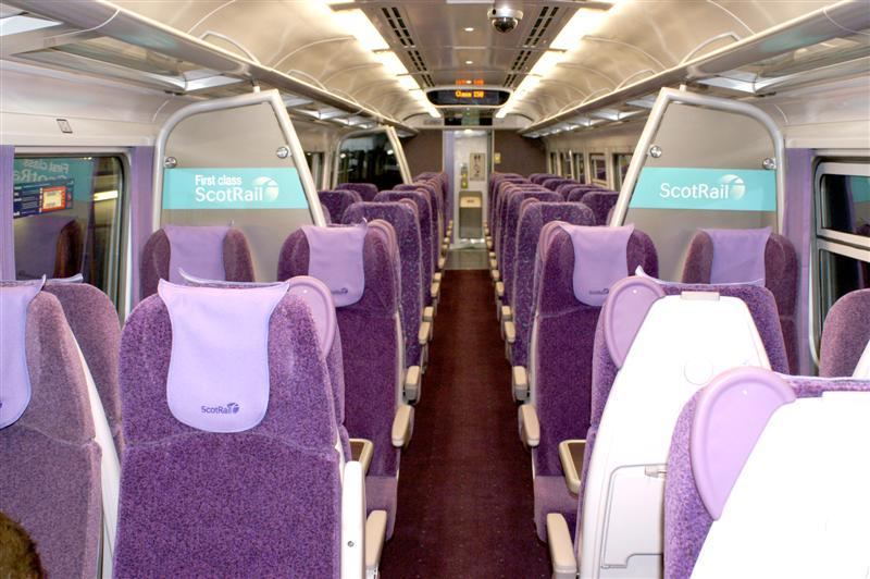158701 Refurbishment: View of 52701 looking towards First Class, note the old compartment door is removed creating an open plan style layout Photo of 158701 Refurbishment