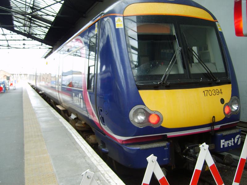 class 170394: by gner125 170 394 awaits departures from inverness with the 16.55 to glasgow queen street (ex-hull trains express buffet) Photo of class 170394