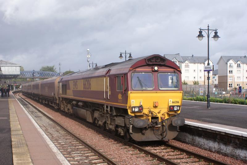 Longannet 66: DB/EWS 66206 , with her empty coal hoppers , waits for permission to proceed whilst being halted at Stirling Station. Photo of Longannet 66