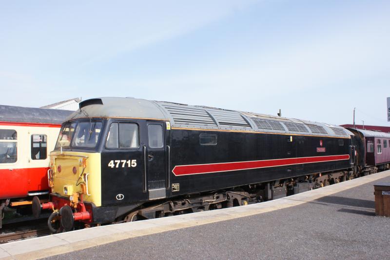 Poseidon: Fragonset liveried Class 47 'Poseidon' sitting idle in the warming sun at Leeming Bar platform on the Wensleydale Railway in N.Yorkshire. Photo of Poseidon