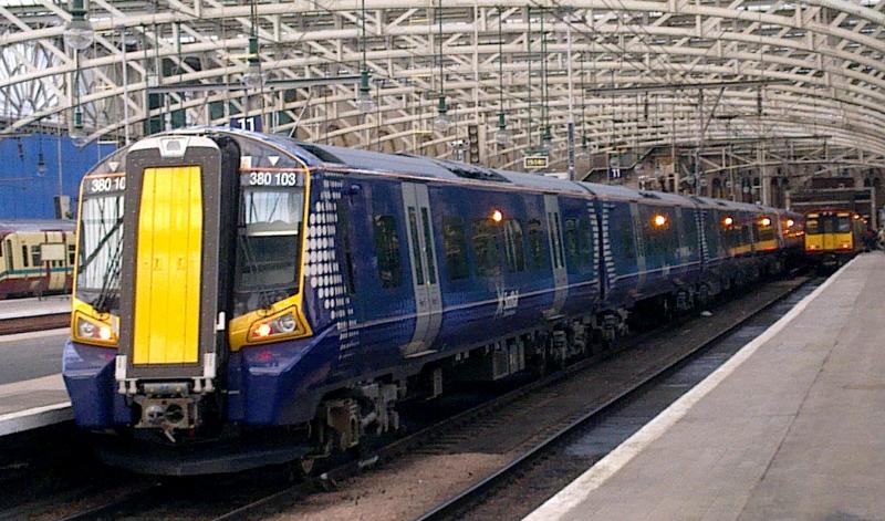 380103 and 380004 At Glasgow Central: Another day another pair. 380103 leads 380004 on the 1530 departure from Glasgow Central to Ayr on Tuesday 18th January 2011 Photo of 380103 and 380004 At Glasgow Central