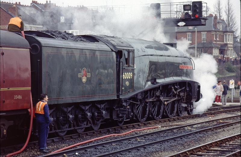 60009 by Les Chatfield: Here is a photo of 60009 being watered. The photographer cannot recall where it was taken - can anybody help? Photo of 60009 by Les Chatfield