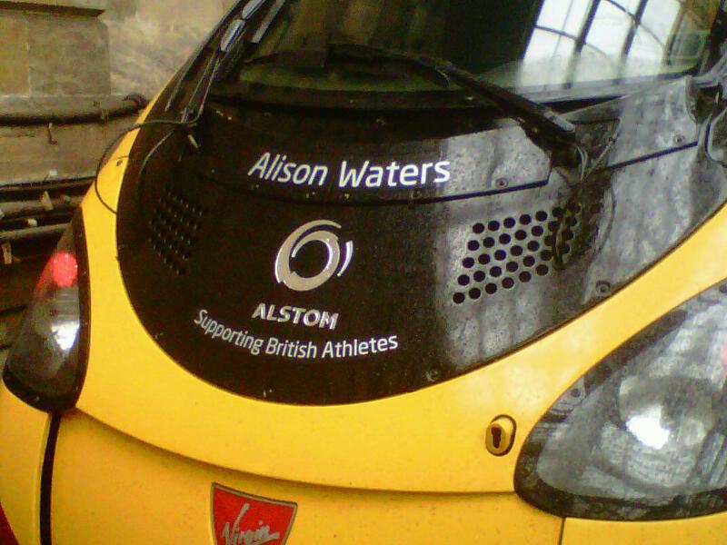 390052 new adornment: Athlete names being carried on 390s, pic taken Glasgow Central 14:30, 5/4/11 Photo of 390052 new adornment