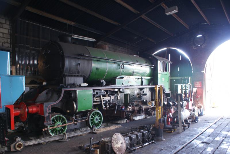 Morayshire out of Commission: Bo'ness & Kinneil Railway's stalwart 'Morayshire' is seen in bits in the steam loco shed. It's wheels are off and the rear of the engine is supported by a large trolley. Photo of Morayshire out of Commission