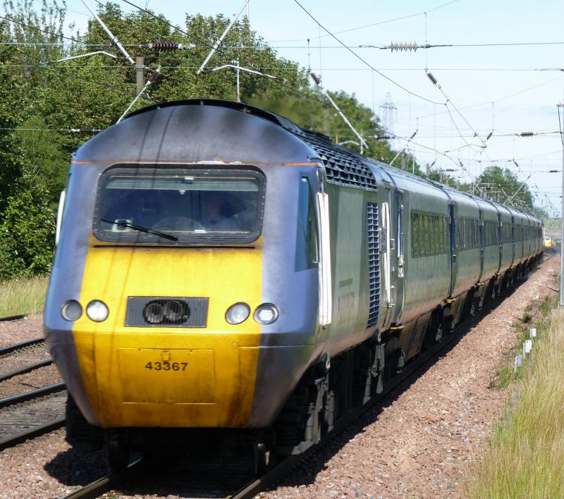 43367 at Prestonpans 23 July 2011: A work stained 43367 heads towards Edinburgh through Prestonpans. In the background 87002 is leaving the loop. Photo of 43367 at Prestonpans 23 July 2011